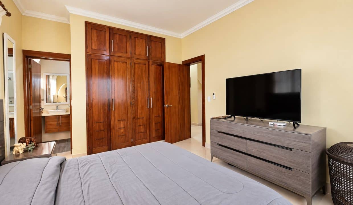 Modern Bedroom with Warm Wood Wardrobe